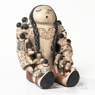 Cochiti Polychrome Pottery Storyteller Figure, signed "Mary Trujillo Cochiti" on the base, depicted seated in traditional attire and wi
