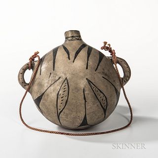 Cochiti Painted Pottery Canteen, c. late 19th century, painted on one side with abstract floral and designs on a cream-colored slip, wi