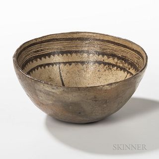 Mimbres Black-on-white Pottery Bowl, decorated with multiple thick and thin framing bands from the rim, the central design missing due