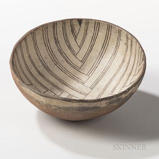 Mimbres Black-on-white Pottery Bowl, the inside decorated with a complex fine line woven pattern, (minor restoration), ht. 3 1/2, wd. 7