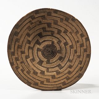 Pima Coiled Basketry Bowl, first quarter 20th century, the flat bottom and gently sloping sides, with a radiating linear maze design fr
