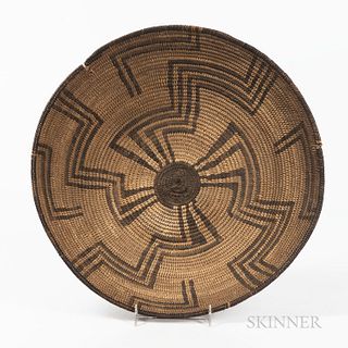 Pima Coiled Basketry Tray, first quarter 20th century, flat bottom with flared sides, decorated with a radiating maze pattern from the