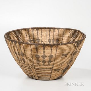 Large Apache Pictorial Coiled Basket, early 20th century, the deep flaring form woven in willow and devil's claw, with a concentric cir