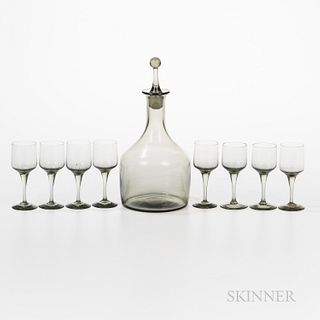 Smoky Glass Cordial Set, possibly Orrefors, comprising a decanter with stopper and eight stemmed cordials with slightly tapering sides,