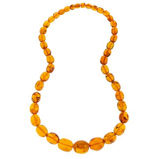 A Large Graduated Amber Necklace