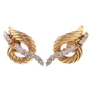 A Pair of Twisted Ribbon Diamond Earrings in 14K