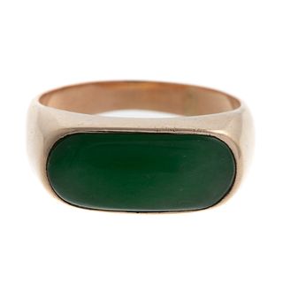 A Bezel-Set Jade Ring in High Polish 14K