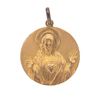 Medalla en oro amarillo de 16k. Imagen del Sagrado Corazón de Jesús. Peso: 3.2 g.