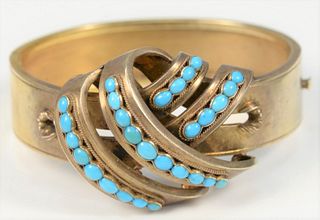 Victorian 14 Karat Gold Bracelet
set with turquoise beads
diameter 2 3/8 inches
28.7 grams