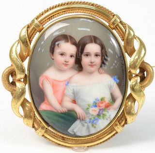 18 Karat Gold Victorian Brooch 
set with center enamel of two children
early to mid 19th century
signed G. Lamuniere
length 2 1/8 inches
Provenance: E