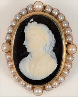 14 Karat Gold and Stone Cameo Brooch/Pendant 
with pearl surround
height 1 5/8"