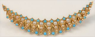 14 Karat Crescent Brooch
set with some pearls and small turquoise
length 2 inches