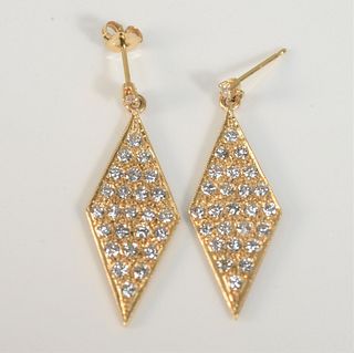 Pair of 14 Karat Gold and Diamond Stud Earrings
each with triangular, 14 karat gold, mounted with twenty-five diamonds
height 1 1/4 inches
4 grams tot