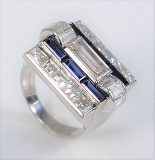 Van Cleef Arpels Platinum Diamond and Blue Sapphire Ring set with center emerald cut diamond, flanked by three emerald cut diamonds on either side, ce