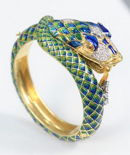 18 Karat Gold Bracelet
with two color enameled dragons, mounted with twenty-four diamonds, including four on tongue
marked Moddep
110.5 grams