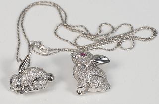 Two 18 Karat White Gold Rabbit Pendants/Brooch
encrusted with diamonds, one on 14K white gold chain
13.2 total grams