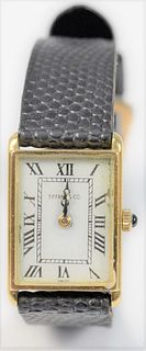 Tiffany & Company 18 Karat Gold Tank Watch
with leather band
18.4 millimeters