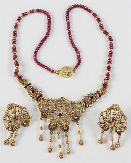 Three Piece 22 Karat Gold Necklace and Earrings
set with rubies, and diamonds
total weight 54.2 grams