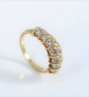 18 Karat Yellow Gold Ring 
set with two rows of seven diamonds, fourteen in total
size 6
approximately 1.5 total carats