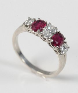 Platinum Ring 
set with three oval diamonds, and two oval rubies
#40104 inside
size 6 1/2