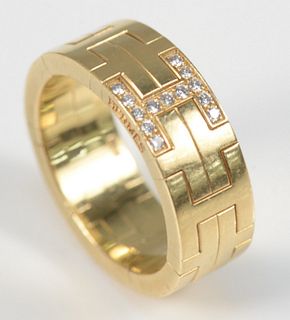 Hermes 18 Karat Gold Kilim Ring
set with thirteen brilliant cut round diamonds
size 6 3/4
.10 carats 
10.8 grams