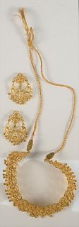 Three Piece 22 Karat Gold Necklace and Earrings Set
125 grams (without string)