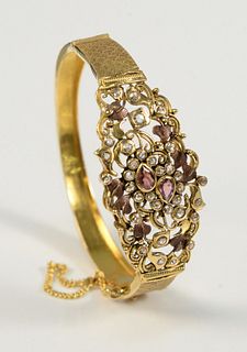 22 Karat Gold Bangle Style Bracelet
set with thirty-three diamonds
26.3 grams