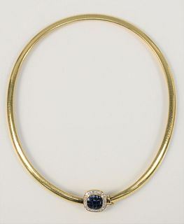 Omega 18 Karat Gold Necklace
having slide set with blue sapphires, surrounded by diamonds
47.1 grams