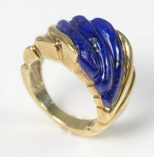 14 Karat Gold Ring
set with carved lapis
size 7
10.4 grams