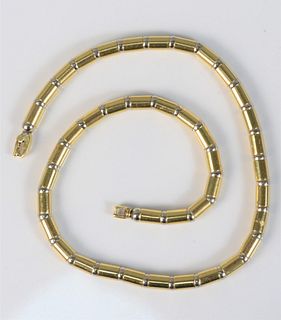 18 Karat Gold Flexible Necklace
made up of 40 barrel form beads
length 15 inches
38.7 grams