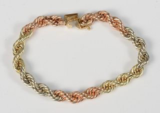 14 Karat Gold Twist Bracelet
tri-color gold
length 7 1/4 inches
10.6 grams