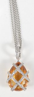 Spark Creations Pear Shaped Citrine
in an 18 karat white gold mount, set with diamonds, on double link 18 karat white gold chain, signed Spark
length 