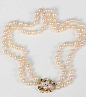 Pearl Double Strand Necklace
medium luster with blemishes
14K yellow gold clasp set with pearls and emeralds, 
length 16 inches
7.5m millimeters