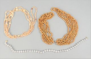Three Pearl Necklaces 
including one light grey, with gold clasp
length 17 1/2 inches, 10.3 millimeters