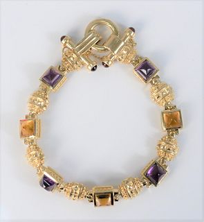 14 Karat Gold Bracelet 
set with square amethyst and citrine
38.5 grams