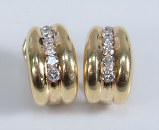 Pair of 14 Karat Gold Earrings 
each set with six diamonds
8.9 grams