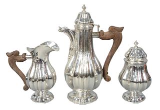 Mario Buccellati Three Piece Sterling Tea Set 
to include tall teapot (height 11 1/4 inches); creamer (height 6 7/8 inches); and covered sugar (height