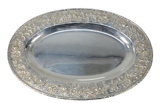 Kirk Repousse Oval Sterling Silver Tray
having floral and scroll repousse border
marked Hand Decorated S. Kirk & Son, Inc., Sterling 2515
10" x 15"
25