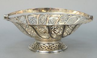 English Silver Reticulated Basket
with swing handle 
height (with handle) 8 inches, diameter 10 inches 
14.8 troy ounces