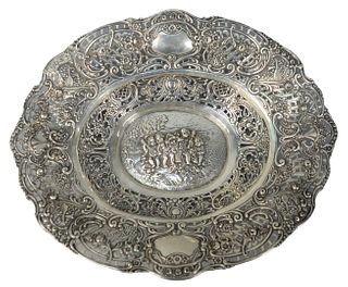 Continental Silver Reticulated Bowl
having embossed center, Putti with instruments
marked 800 and hallmarked in center
top 11" x 13"
14.8 troy ounces
