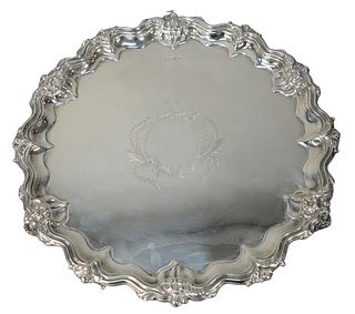 Walker & Hall English Silver Salver
having wavy edge with flowers, set on scrolled feet, marked Walker & Hall, Sheffield, England on bottom
height 1 i
