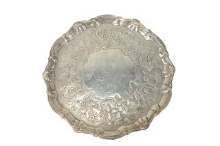 William Peaston 1746 Silver Salver
with chased strawberries, apples, pears, and flowers, rim with shells, all set on three feet
height 1 1/4 inches, d