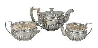 English Silver Three-piece Tea Set
teapot, sugar, and creamer
marked with R.W., in an oval on bottom
teapot height 5 1/2 inches
46.9 troy ounces