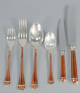 106 Piece Christofle Talisman Pattern Silver Plated and Enameled Flatware Set
to include 12 dinner forks, 12 dinner knives, 10 fish knives, 12 salad f