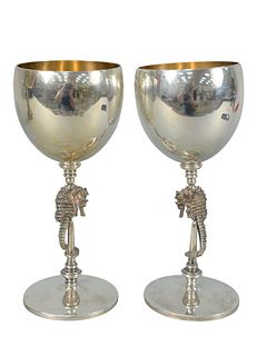 Jocelyn Burton set of ten silver goblets on seahorse stems, set on round bases, all with gilt interiorsheight 7 3/4 inches122.9 troy ounces