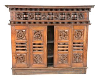 Walnut Two Part Cabinet
with sliding doors, and carved spindles
late 18th century - early 19th century, possibly Moorish or French
height 63 1/4 inche