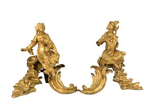 A Pair of Louis XV Ormolu Chenets
circa 1740
each modeled as a Chinoiserie figure, seated atop C-scroll, and rocky ledge
the taller height 14 1/2 inch