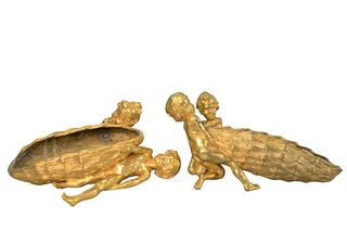 A Pair of Raoul Francois Larche (1860 - 1912)
French gilt bronzes 
figural flower basket, both depicting two girls trying to move the oversized basket