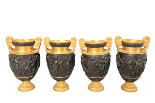 Set of Four Bronze Urns
having gilt bronze handles
partially clad nude, classical figures
height 7 3/4 inches