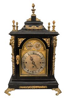 English Bracket Chime Clock
having silvered brass dial, two sub dials, "chime/silent and chime as St. Mary's Cambridge chime on eight bells",
brass wo
